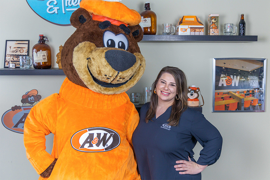 Lauren Knarr and Rooty the Great Root Bear