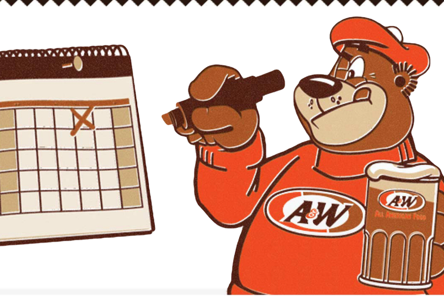 Rooty the Great Root Bear holding mug of A&W Root Beer in one hand and a marker in the other. Rooty is marking dates on a calendar.
