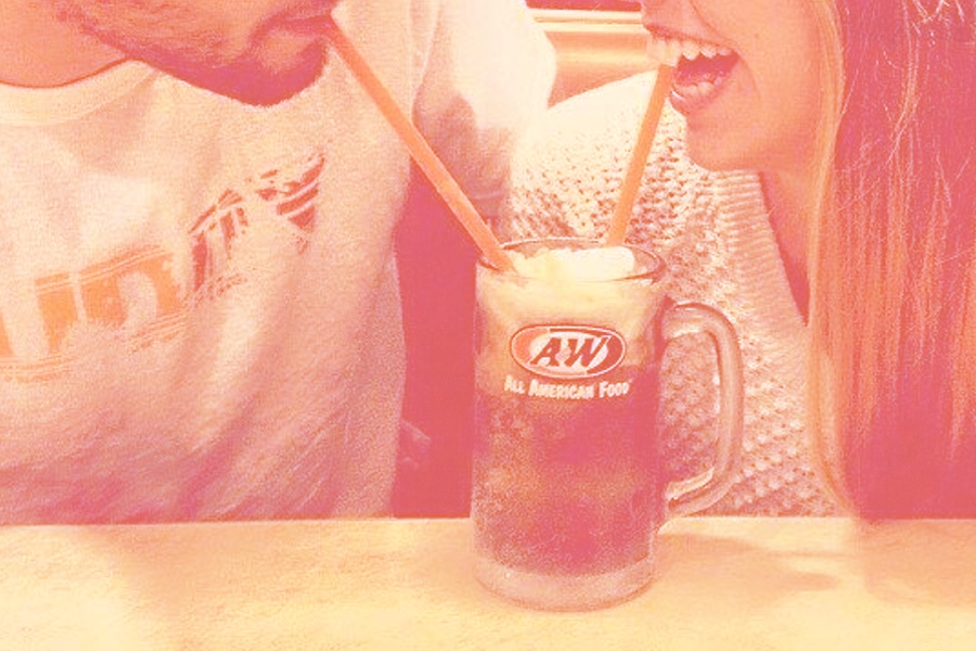 Two people sharing a Root Beer Float